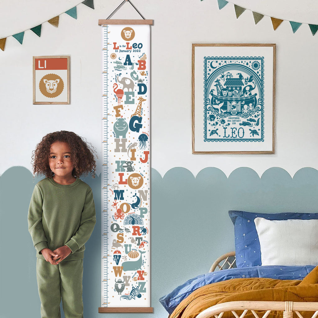 Personalised animal alphabet height chart in natural colours with oak hangers